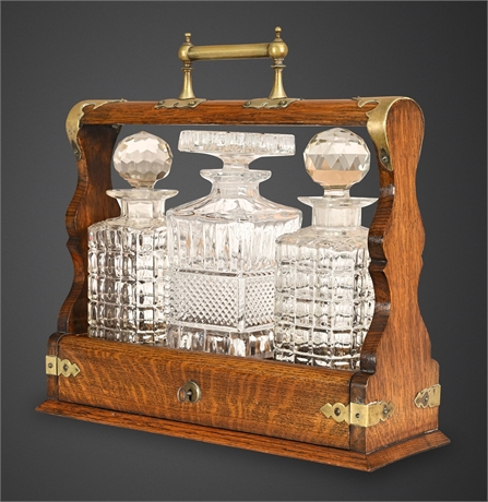 Edwardian Oak & Brass Three-Decanter Tantalus with Cut Crystal & Locking Drawer