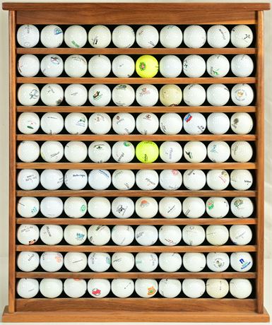 100 Golf Balls on Wood Display Shelf