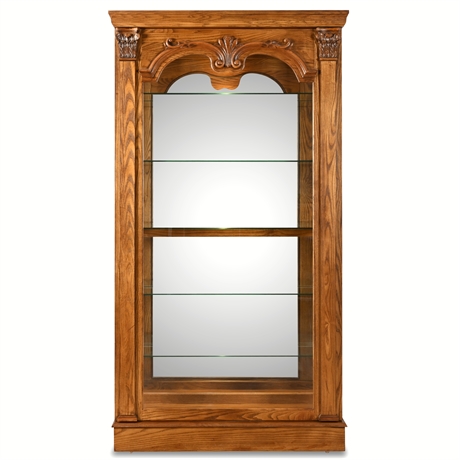 Pulaski Furniture Sliding Door Illuminated Curio Cabinet with Mirrored Back