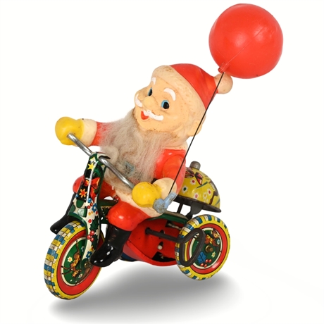 Suzuki “Santa Claus Cycle” Tin Wind-Up Tricycle with Balloon — Vintage Japan
