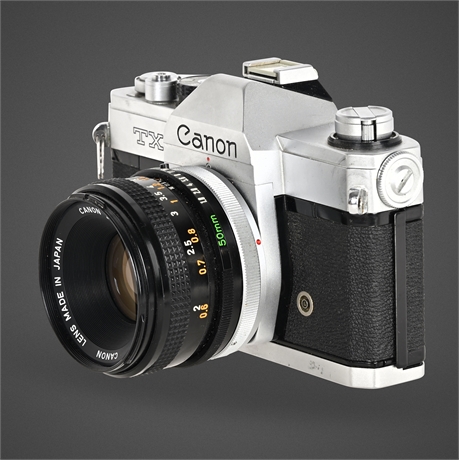 Canon TX 35mm SLR Film Camera w/ FD 50mm f/1.8 S.C. Lens
