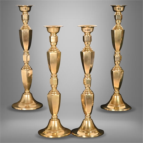 Four 21" Polished Brass Candlesticks