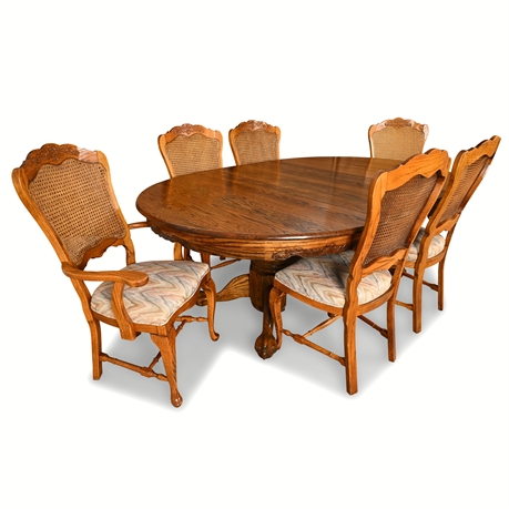 Vintage Oak Dining Set – Pedestal Table & 8 Cane-Back Chairs