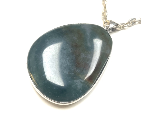 Sterling Silver Necklace And Teal Stone Pendant