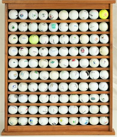 100 Golf Balls on Wood Display Shelf