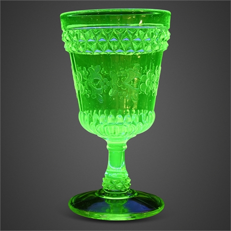 L.G. Wright Uranium Glass Goblet – Adams Wildflower Pattern, 6 1/8"