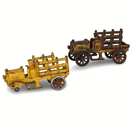 Pair of Early Cast Iron Stake-Bed Toy Trucks, Stamped “1451,” c.1920s