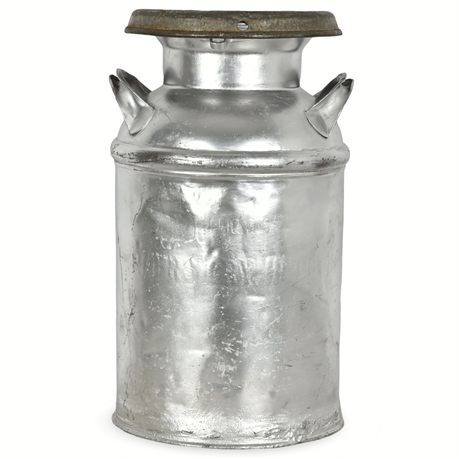 Farmers Pry Hull Milk Can