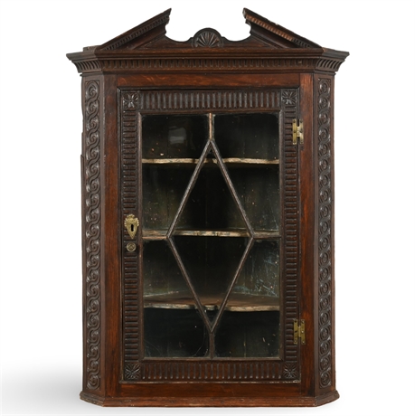 Antique Georgian Corner Cabinet with Glazed Door and Intricate Carvings