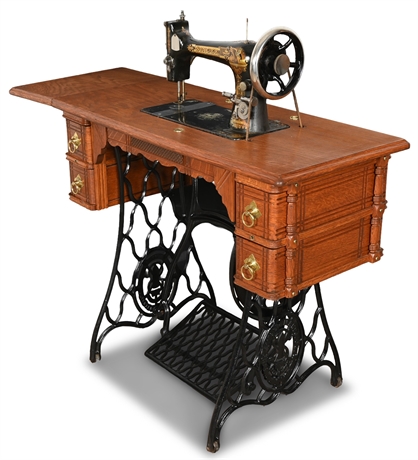 1892 Singer Treadle Sewing Machine with Oak Cabinet and Accessories