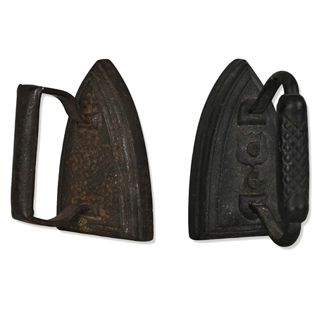 Pair of Antique Cast Iron Sad Irons — “C” Model 6, 6" Long, Rustic Finish